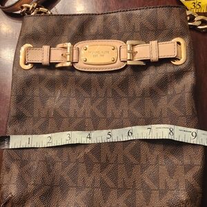 Michael Kors Monogram Crossbody bag w/ Buckle design.AUTHENTIC Great Condition.